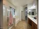 Large bathroom with double sinks, soaking tub, and walk-in shower at 2515 W Minton St, Phoenix, AZ 85041
