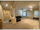 Living room with high ceilings, columns, and ample natural light at 2515 W Minton St, Phoenix, AZ 85041