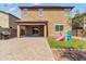 Large backyard with paver patio, artificial turf and playset at 21243 W Coronado Rd, Buckeye, AZ 85396