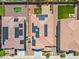 Aerial view of house with solar panels and surrounding homes at 21243 W Coronado Rd, Buckeye, AZ 85396