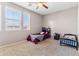 Bedroom with twin bed, toddler bed, and ample natural light at 21243 W Coronado Rd, Buckeye, AZ 85396