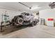 Garage with an ATV on a trailer and storage at 21243 W Coronado Rd, Buckeye, AZ 85396