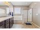 Bathroom boasts a soaking tub, shower, and double vanity at 21243 W Coronado Rd, Buckeye, AZ 85396
