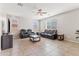 Spacious living room featuring comfortable seating and large windows at 21243 W Coronado Rd, Buckeye, AZ 85396