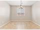 Bright dining room with tile flooring and a chandelier at 21243 W Coronado Rd, Buckeye, AZ 85396