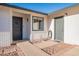 Front entrance of house with gray door and brick walkway at 8716 E Mitchell Dr, Scottsdale, AZ 85251