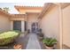 Inviting entryway with a courtyard and seating at 3285 N 159Th Ave, Goodyear, AZ 85395