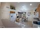 Well-equipped kitchen with ample cabinetry, a breakfast nook, and tile flooring at 3285 N 159Th Ave, Goodyear, AZ 85395