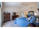 Main bedroom with plush carpeting, ceiling fan, and window coverings at 3285 N 159Th Ave, Goodyear, AZ 85395