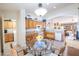 Open kitchen with island, ample counter space, and a breakfast nook at 3285 N 159Th Ave, Goodyear, AZ 85395