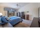 Main bedroom with plush carpeting, ceiling fan, and window coverings at 3285 N 159Th Ave, Goodyear, AZ 85395