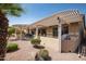 Relaxing patio area with pergola, seating, and desert landscaping at 3285 N 159Th Ave, Goodyear, AZ 85395