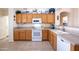 Efficient kitchen with ample counter space, cabinets and appliances at 3285 N 159Th Ave, Goodyear, AZ 85395
