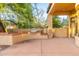 Outdoor kitchen area with grill and seating at 9280 E Thompson Peak Pkwy # 42, Scottsdale, AZ 85255