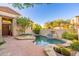 Private pool with stonework and landscaping at 9280 E Thompson Peak Pkwy # 42, Scottsdale, AZ 85255