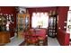 Formal dining room with a large table and hutch at 15576 W Coral Pointe Dr, Surprise, AZ 85374
