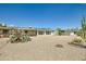 Large backyard with gravel and desert landscaping at 10619 W Clair Dr, Sun City, AZ 85351