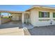 Front view of the house showing the entrance and landscaping at 10619 W Clair Dr, Sun City, AZ 85351