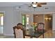 Spacious dining area with granite breakfast bar and tile floors at 19434 N 130Th Ave, Sun City West, AZ 85375