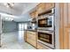 Kitchen with double ovens and granite countertops at 19434 N 130Th Ave, Sun City West, AZ 85375