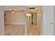 Bright hallway with tile floors and access to rooms at 19434 N 130Th Ave, Sun City West, AZ 85375
