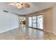 Living room with view of kitchen and patio at 19434 N 130Th Ave, Sun City West, AZ 85375