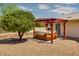 Relaxing hot tub situated under a wooden pergola at 19434 N 130Th Ave, Sun City West, AZ 85375