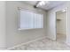 Small bedroom with window and closet at 19434 N 130Th Ave, Sun City West, AZ 85375