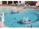 Relaxing community pool with fountains and plenty of space for lounging at 19434 N 130Th Ave, Sun City West, AZ 85375