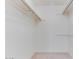 Large walk-in closet with double hanging rods at 19434 N 130Th Ave, Sun City West, AZ 85375