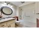 Clean bathroom with tub, shower, and updated vanity at 19434 N 130Th Ave, Sun City West, AZ 85375