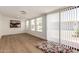 Bright room with wood-look floors and sliding glass doors at 429 S 80Th Way, Mesa, AZ 85208