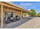 Covered patio perfect for outdoor dining and entertaining at 26447 S Snead Dr, Sun Lakes, AZ 85248