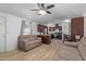Open concept living area with kitchen, dark cabinets and light floors at 501 E Ray Rd # 211, Chandler, AZ 85225