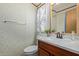Clean bathroom with updated vanity and floral wallpaper at 501 E Ray Rd # 211, Chandler, AZ 85225
