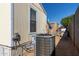 Home exterior showcasing AC unit and satellite dish at 501 E Ray Rd # 211, Chandler, AZ 85225
