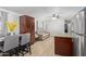 Open living room with a couch and access to kitchen and dining areas at 501 E Ray Rd # 211, Chandler, AZ 85225