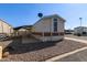 Mobile home with a fenced yard and satellite dish at 501 E Ray Rd # 211, Chandler, AZ 85225