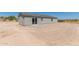 Rear view of house with desert landscaping at 14659 N Riverview Ct, Florence, AZ 85132