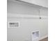 Laundry room with hookups and shelving at 14659 N Riverview Ct, Florence, AZ 85132