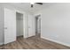 Bedroom with closet and wood-look floors at 14659 N Riverview Ct, Florence, AZ 85132