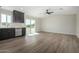 Modern kitchen with dark cabinetry and stainless steel appliances at 14659 N Riverview Ct, Florence, AZ 85132