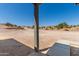 View from covered patio shows a large undeveloped lot at 14659 N Riverview Ct, Florence, AZ 85132