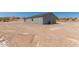 Side view of house on desert lot at 14659 N Riverview Ct, Florence, AZ 85132