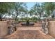 Landscaped courtyard with a water fountain and brick walkways at 17458 N 97Th St, Scottsdale, AZ 85255