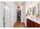 Bathroom with double vanity and shower at 17540 W Glenhaven Dr, Goodyear, AZ 85338
