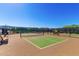 Well-maintained pickleball courts with benches for residents at 17540 W Glenhaven Dr, Goodyear, AZ 85338