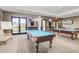 Recreation room with two billiard tables at 17540 W Glenhaven Dr, Goodyear, AZ 85338