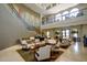 Elegant community lobby with seating area and high ceilings at 17540 W Glenhaven Dr, Goodyear, AZ 85338