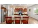 Kitchen boasts granite countertops and stainless steel appliances at 17540 W Glenhaven Dr, Goodyear, AZ 85338